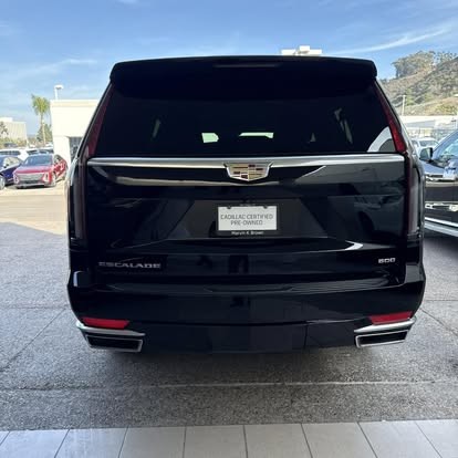 Rear view of the black Cadillac Escalade